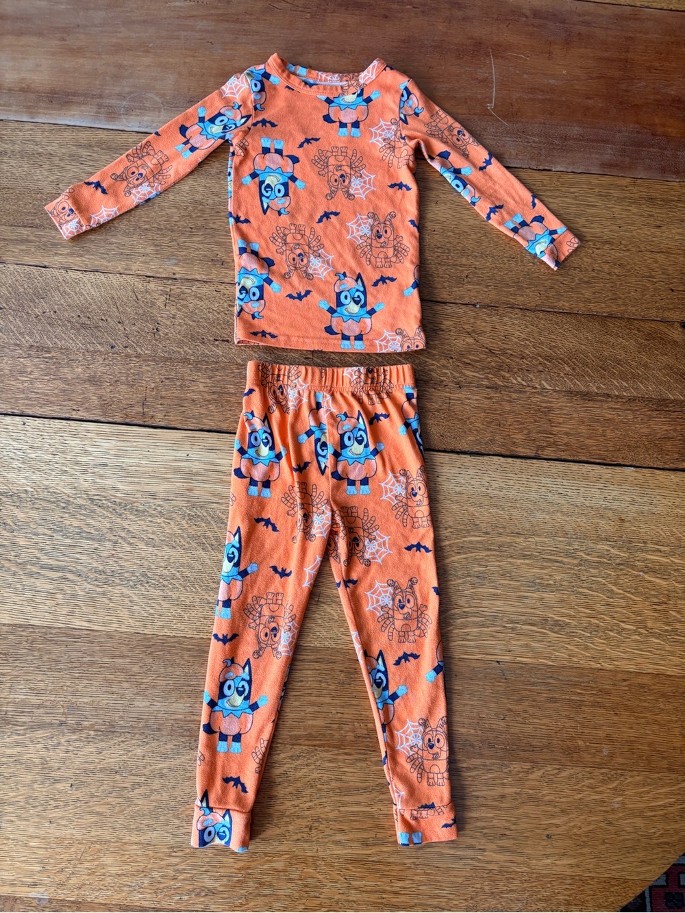 Kids Orange Halloween Pajama Set with Blue Character Print